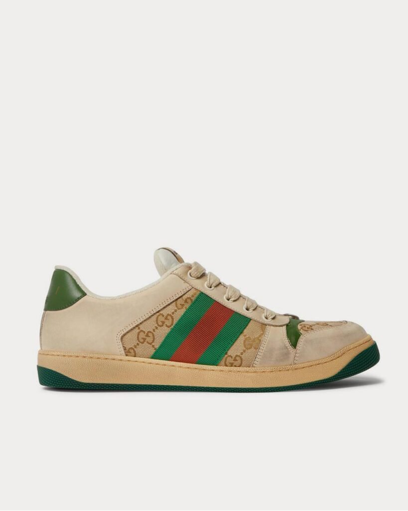 Baskets basses marron en toile monogrammée et cuir vieilli à finitions en sangle Gucci Screener