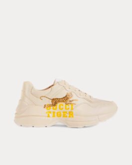 Baskets basses Gucci Tiger Rhyton en cuir ivoire