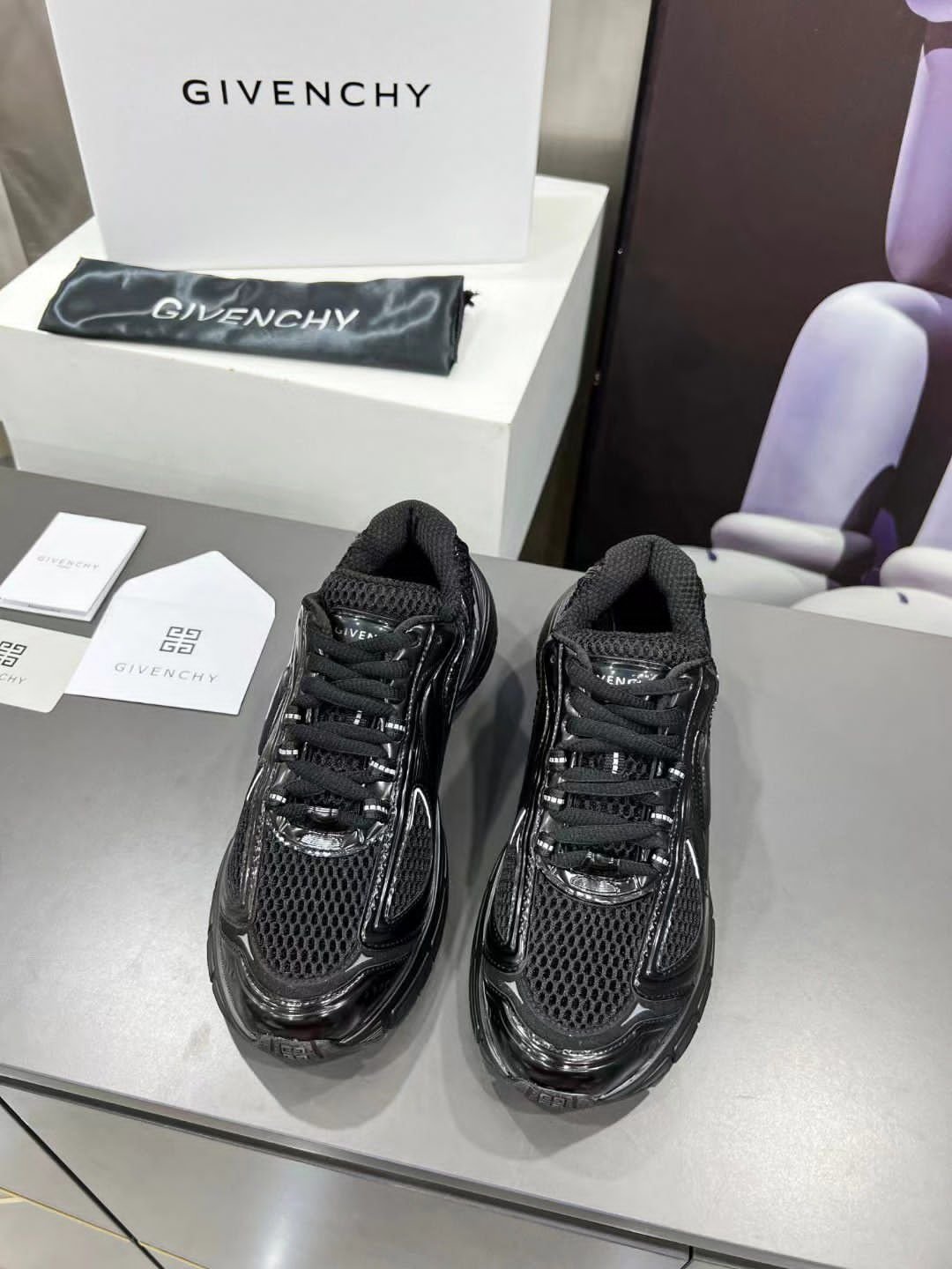 GIVENCHY | Baskets noires TK-MX Runner en mesh et cuir synthétique