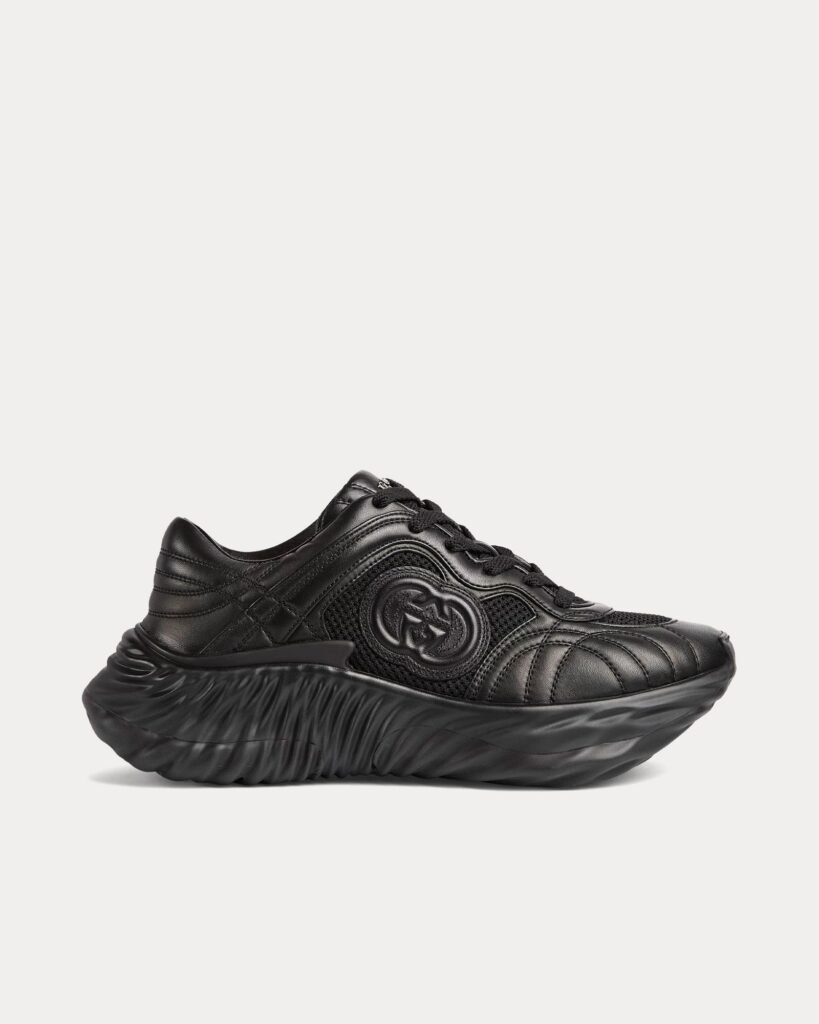 Baskets basses Gucci en cuir noir avec G entrelacés