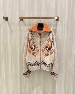 Pull zippé Louis Vuitton en maille beige et orange – Motifs graphiques et col montant