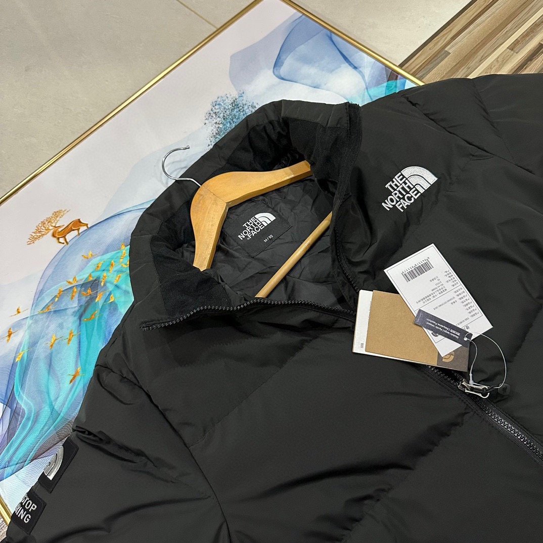 Veste doudoune North Face chaude et légère pour l'hiver – Image 5