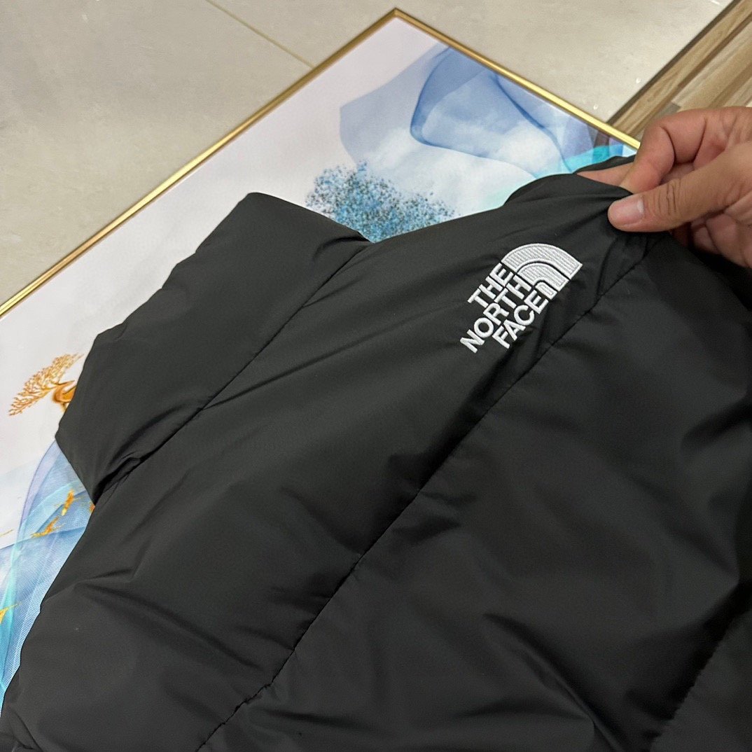 Veste doudoune North Face chaude et légère pour l'hiver – Image 8