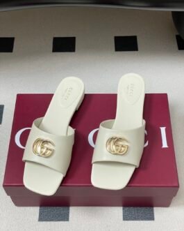 Mules Gucci avec Double G en cuir blanc pour femme