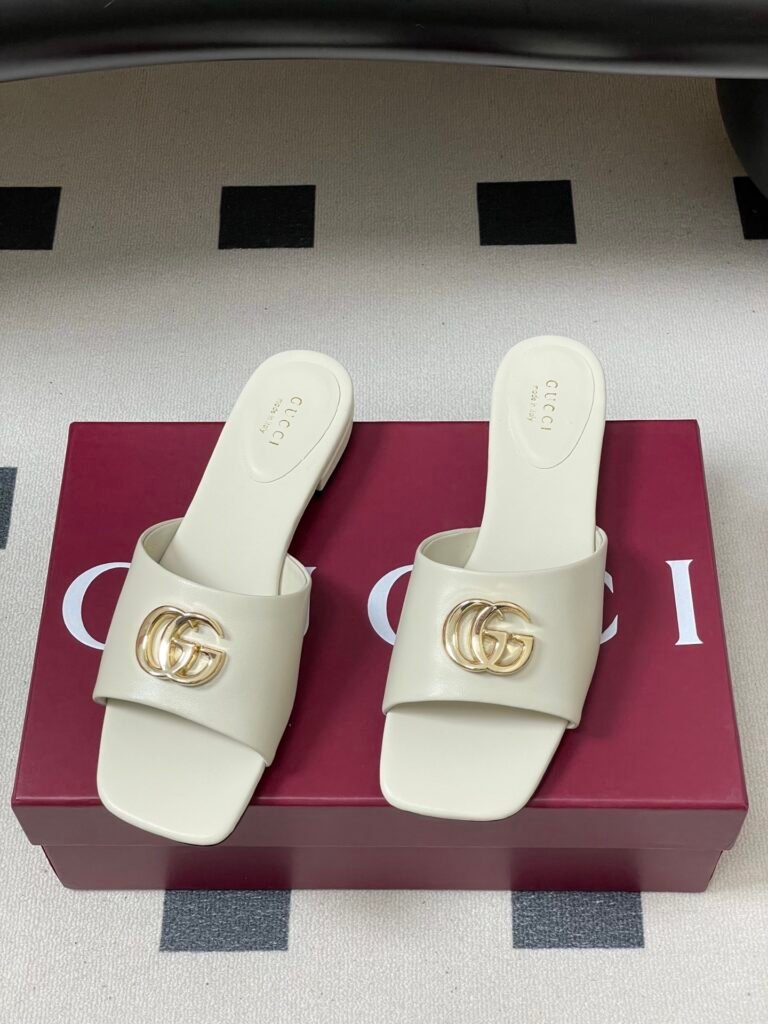 Mules Gucci avec Double G en cuir blanc pour femme