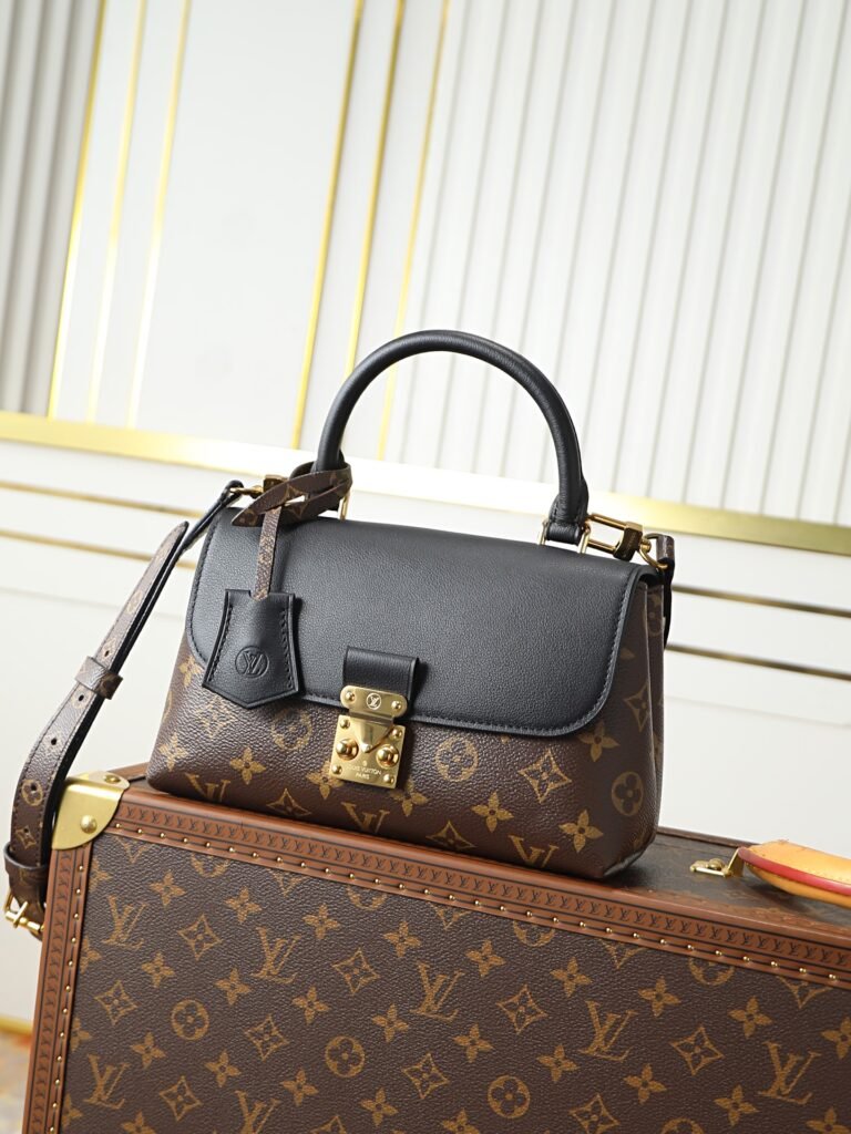 Sac à main Louis Vuitton Madeleine BB en toile Monogram et cuir noir