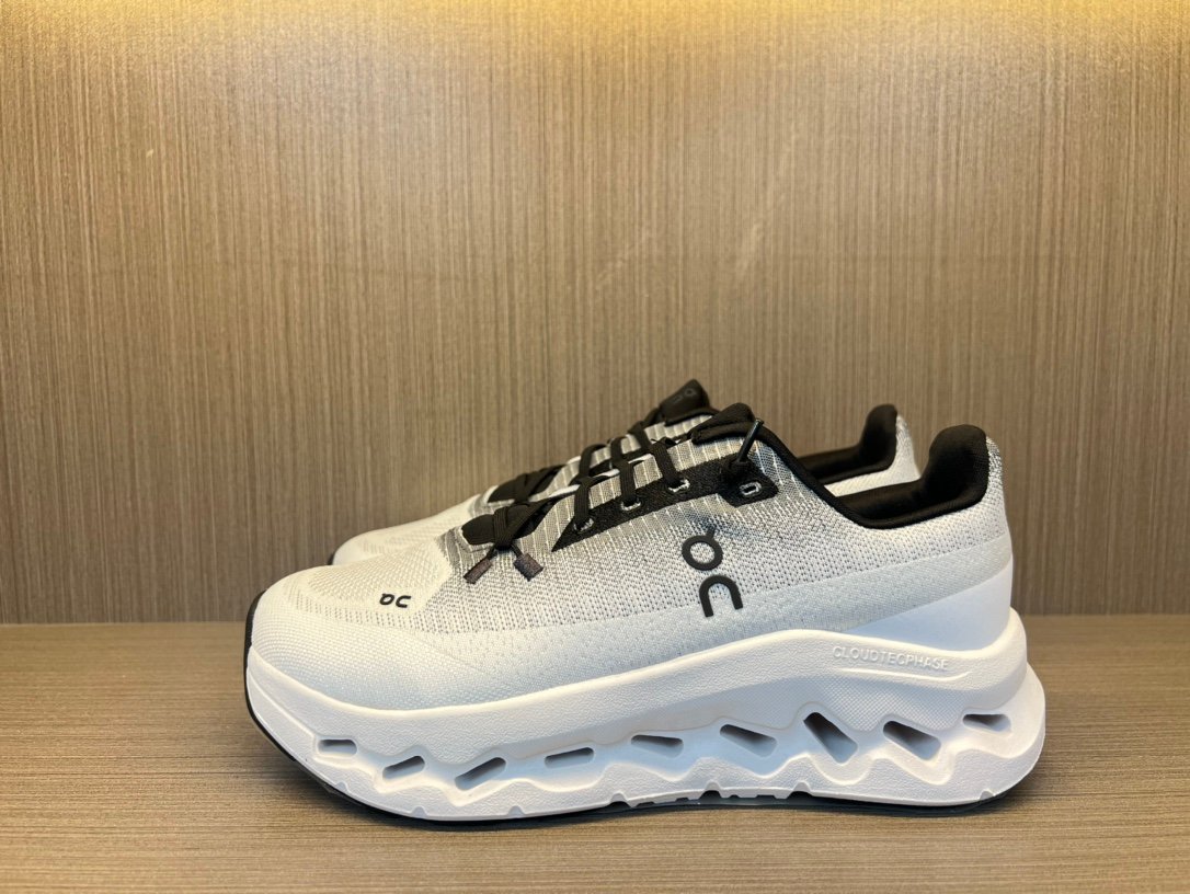 On Running Baskets On Cloudmonster 2 homme blanc et noir