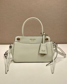 Prada Sac à main à œillets et liens latéraux