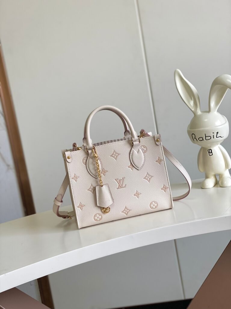Louis Vuitton OnTheGo sac Monogram écru et rose poudré
