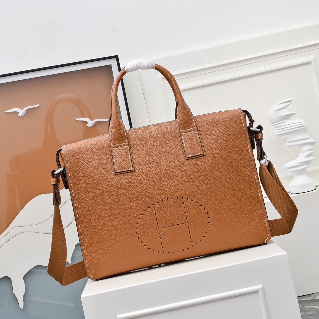 Hermès sacoche à poignées et H perforé