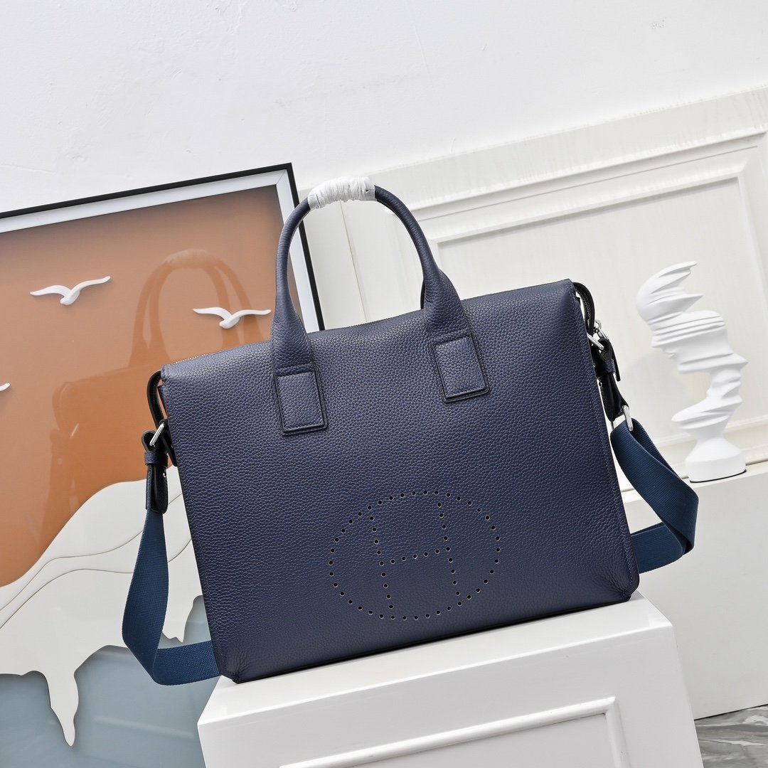 Hermès sacoche à poignées et H perforé