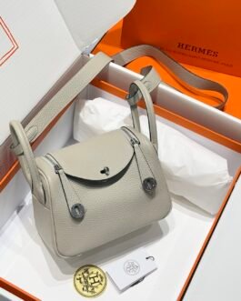 Hermès sac arrondi à fermoirs ovales