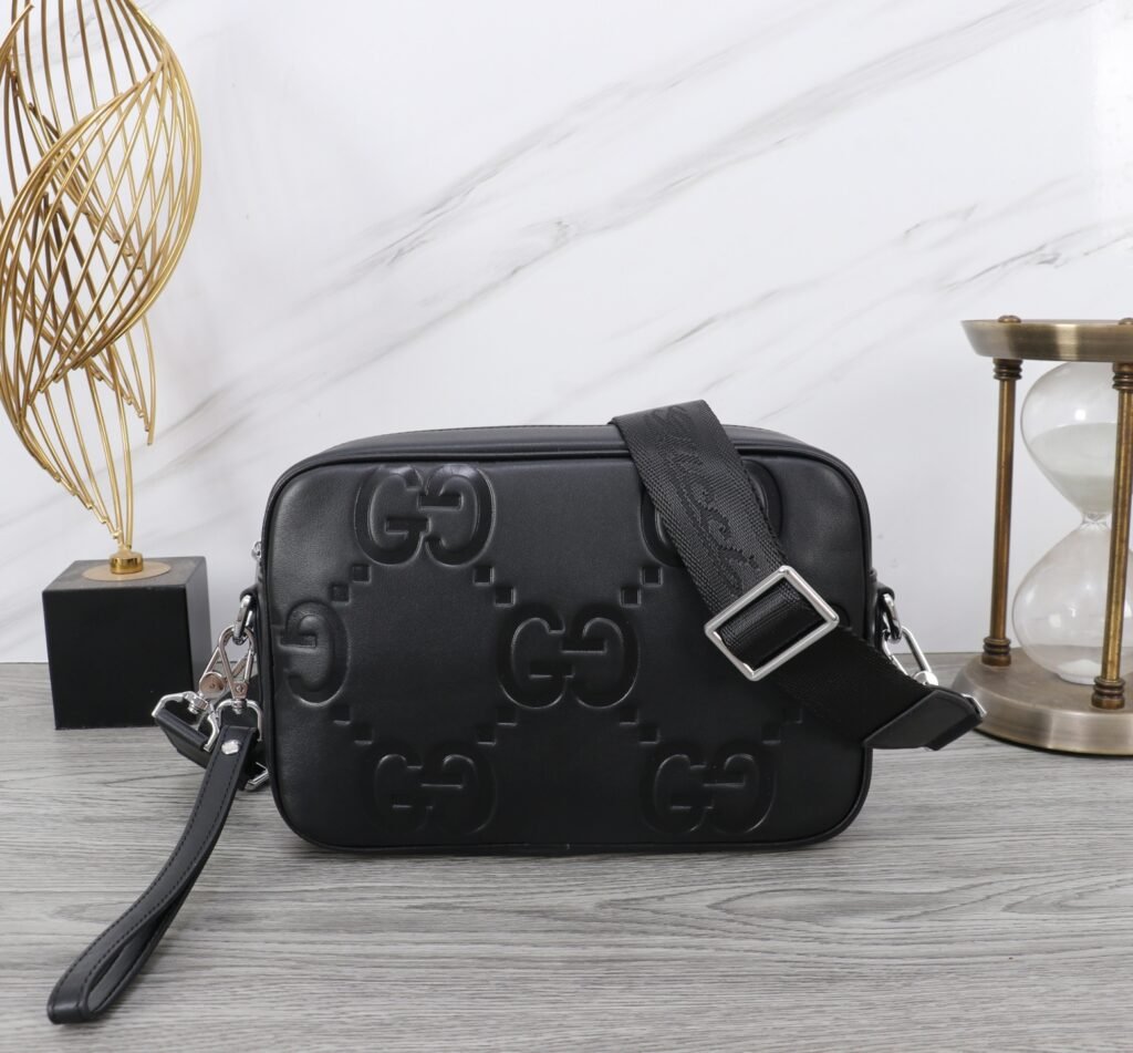 Gucci Sacoche bandoulière GG embossée noire