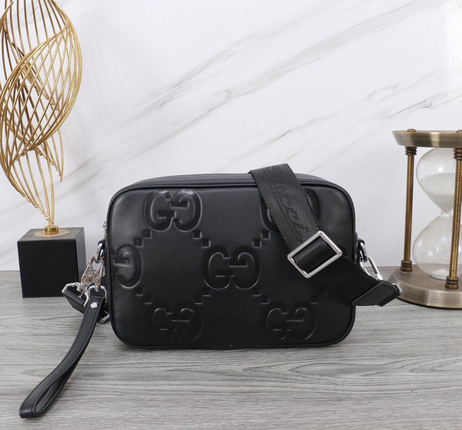 Gucci Sacoche bandoulière GG embossée noire