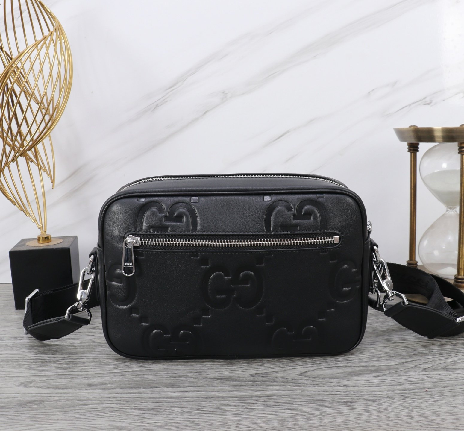 Gucci Sacoche bandoulière GG embossée noire