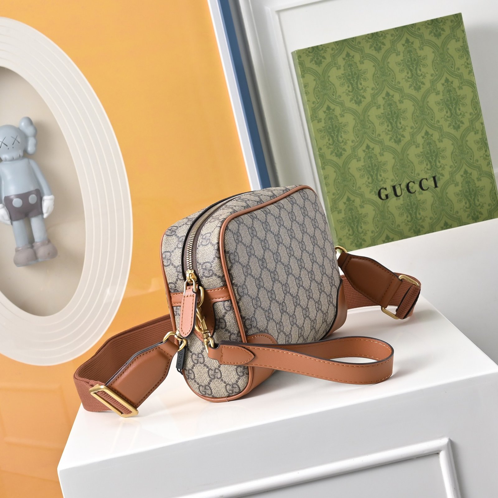 Gucci Sacoche GG beige à finitions cuir marron