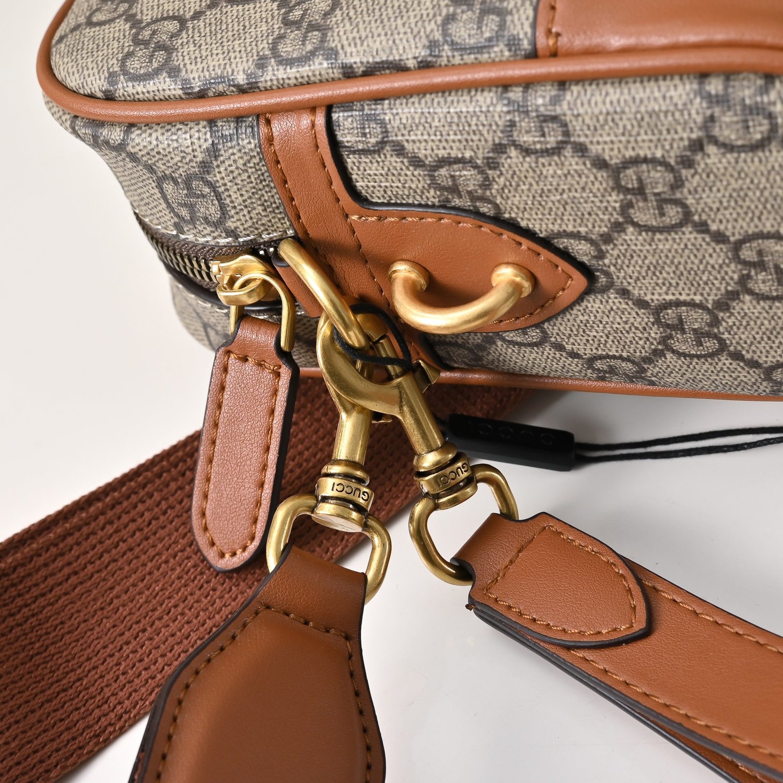 Gucci Sacoche GG beige à finitions cuir marron