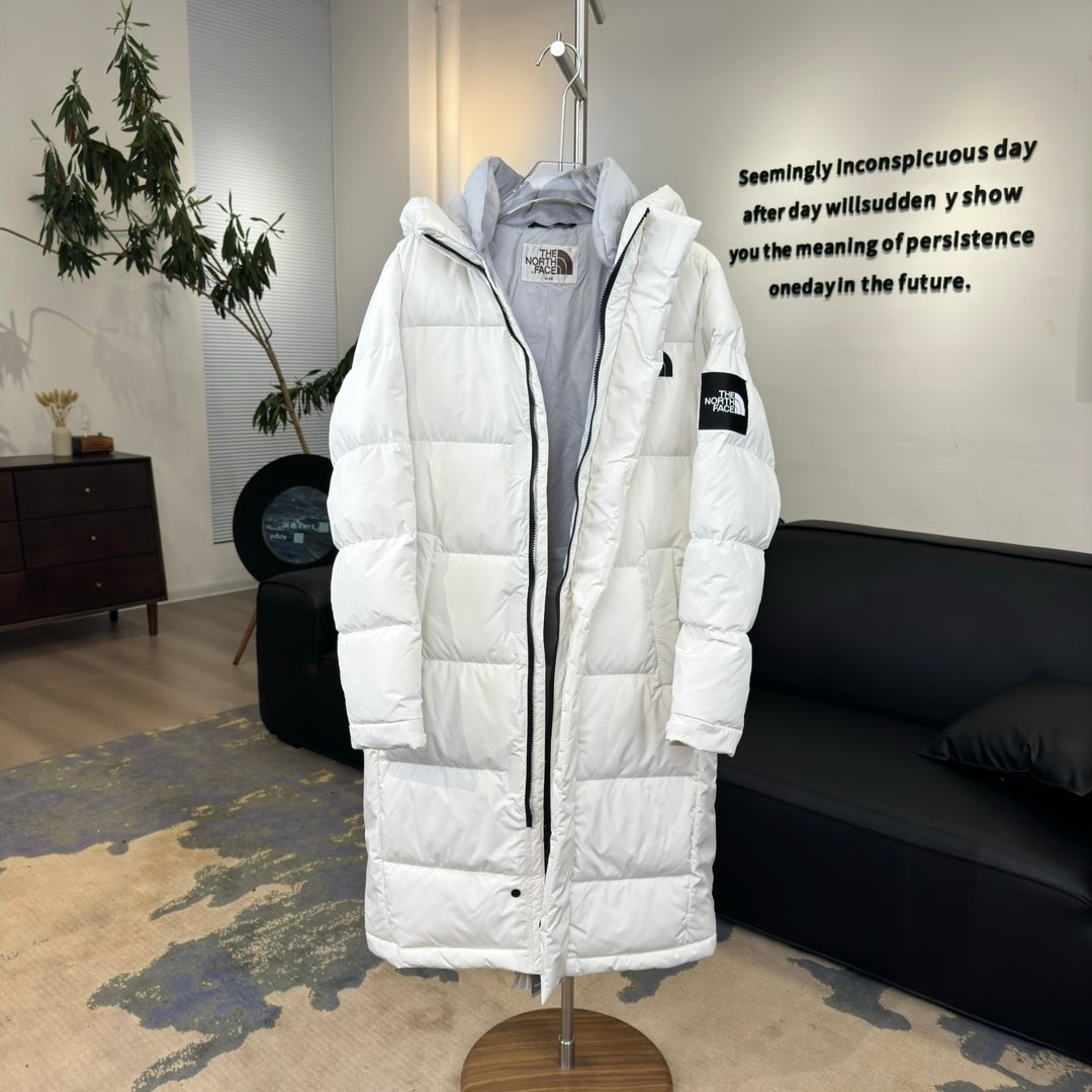 The North Face Parka longue blanche à capuche