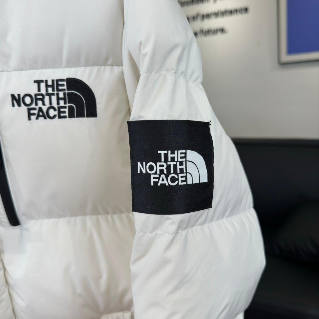 The North Face Parka longue blanche à capuche
