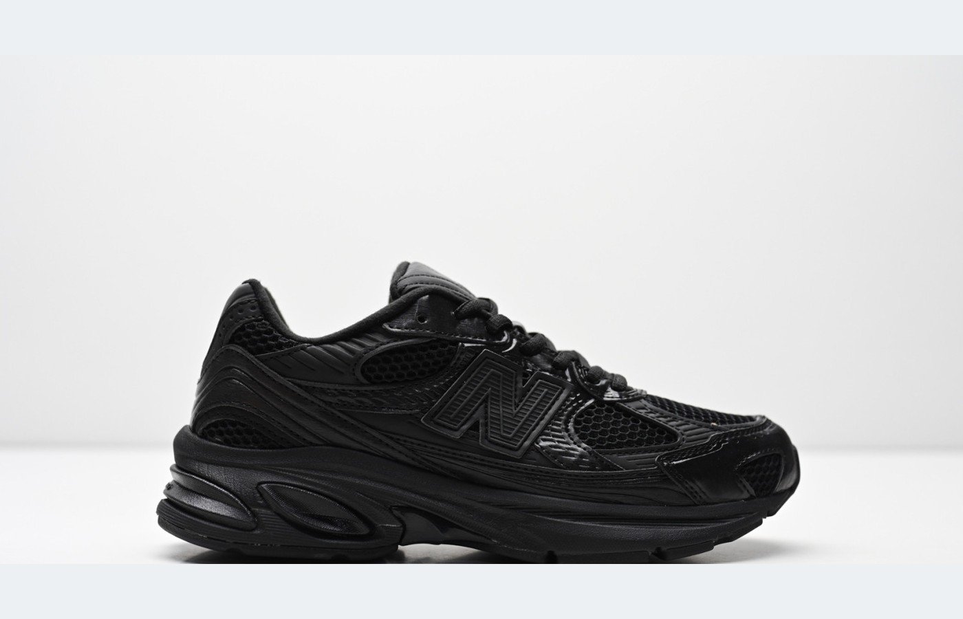 New Balance 509 – Noir / Gris foncé