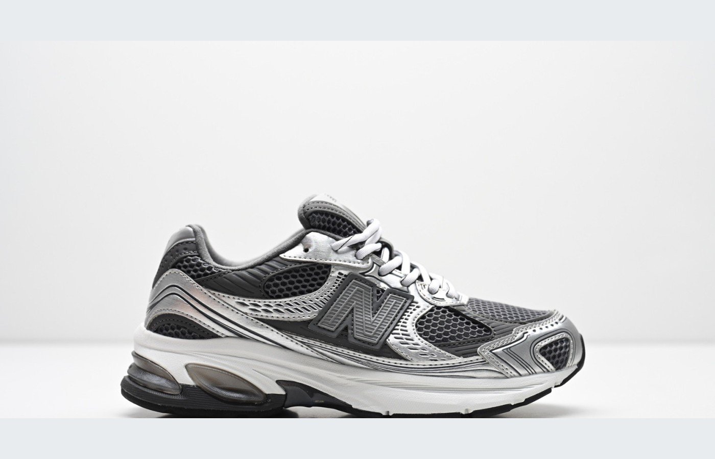 New Balance 509 – Gris clair / Noir