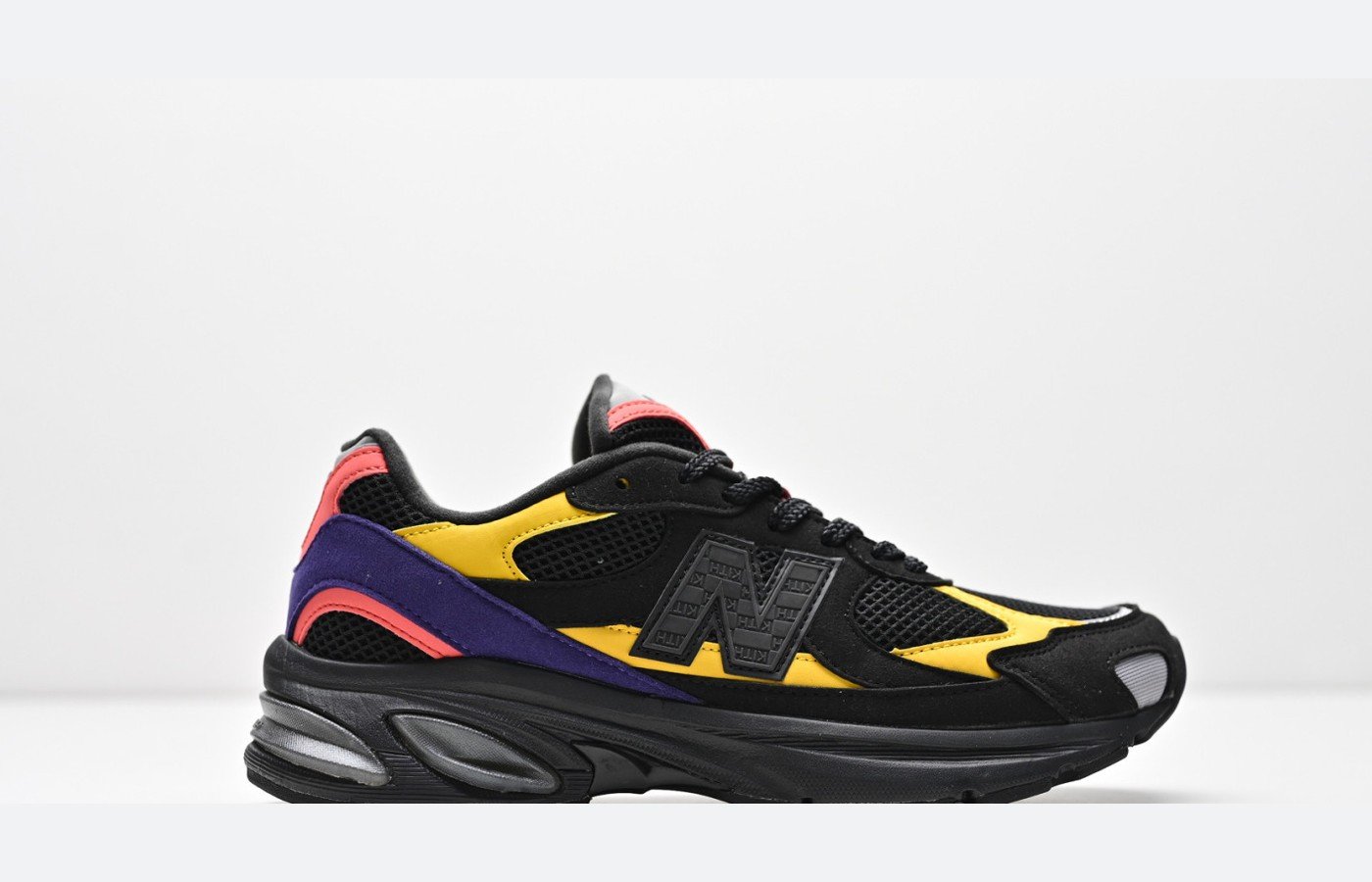 New Balance 509 – Noir / Violet