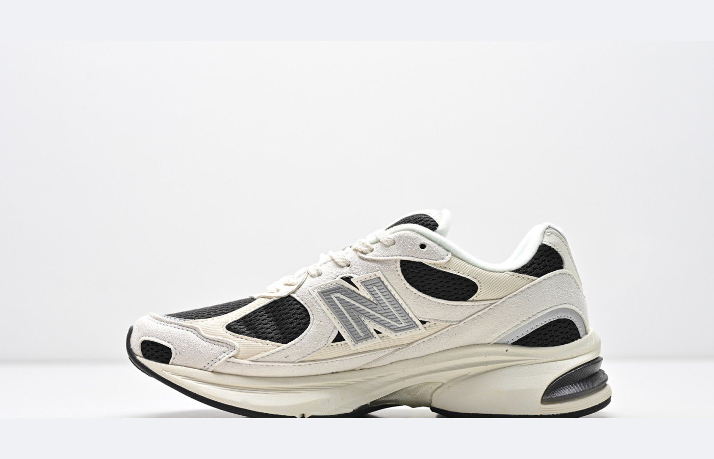 New Balance 509 – Gris clair / Noir – Variante 2