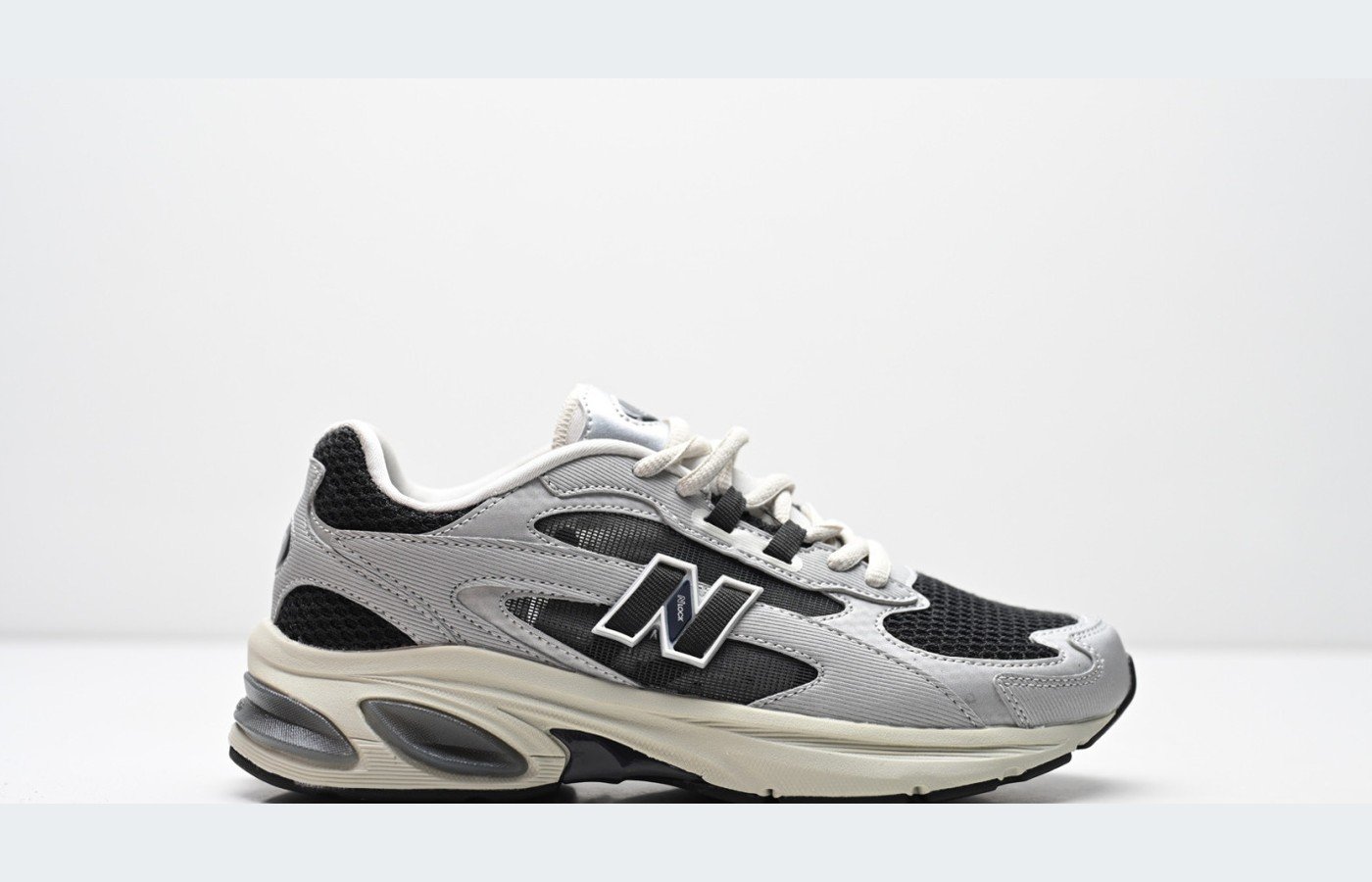 New Balance 509 – Gris / Noir