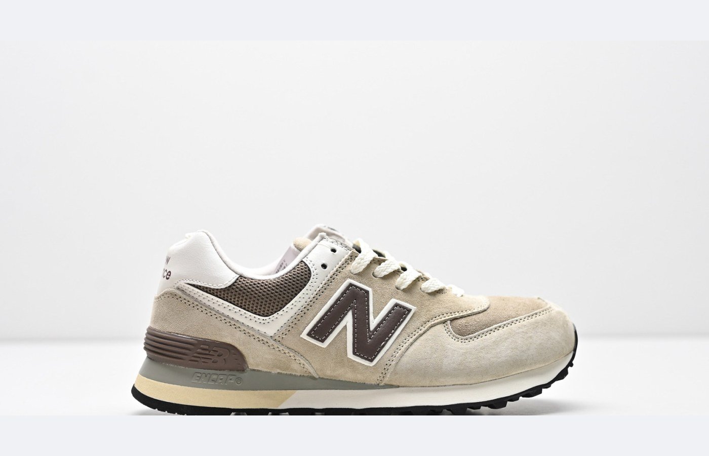 New Balance 574 – Beige / Gris clair