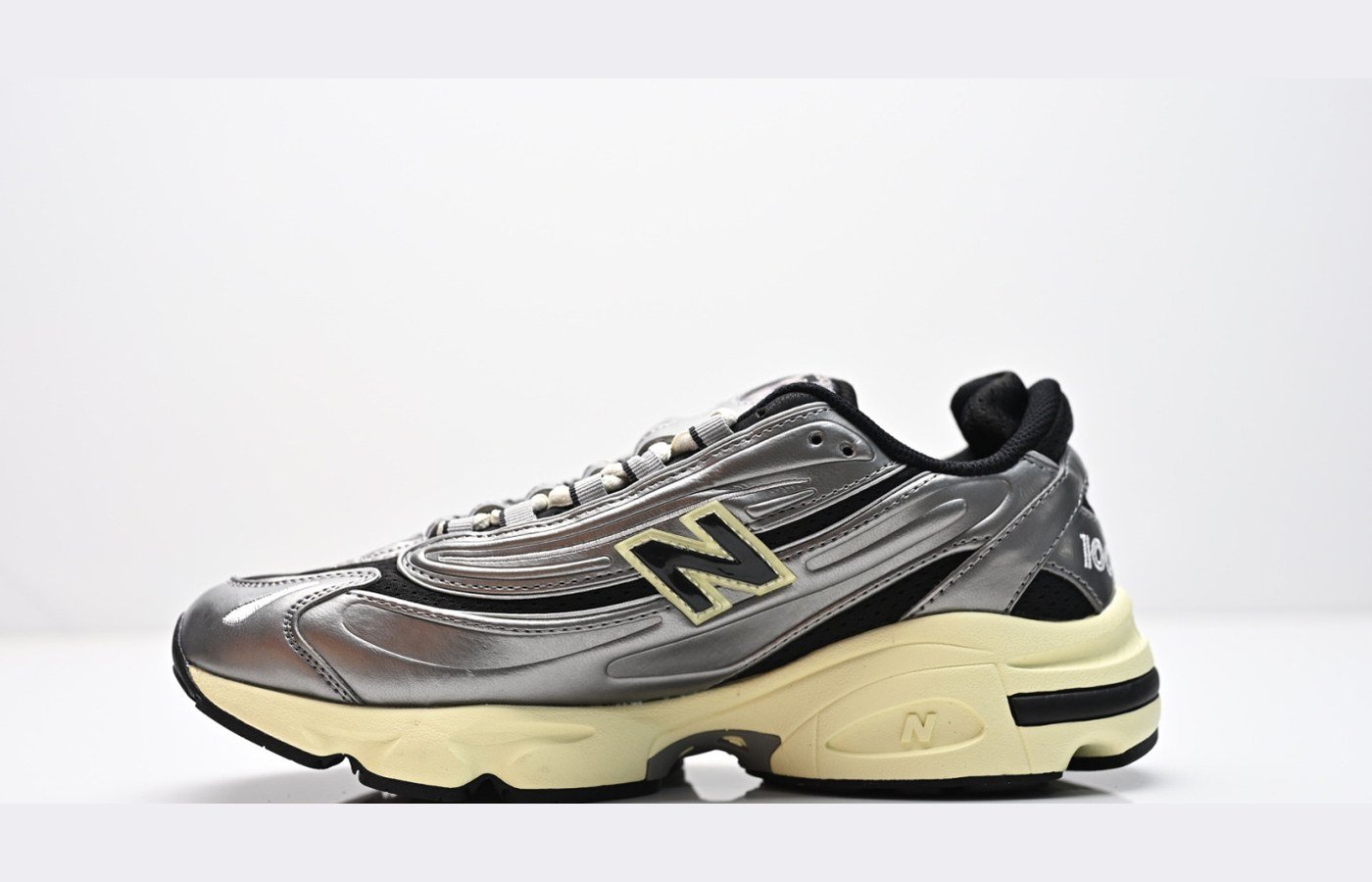 New Balance 1000 – Beige / Gris