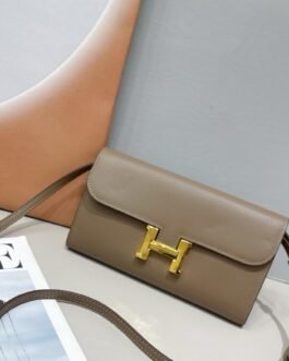 Hermès Constance To Go – Taupe – fermoir doré et bandoulière cuir