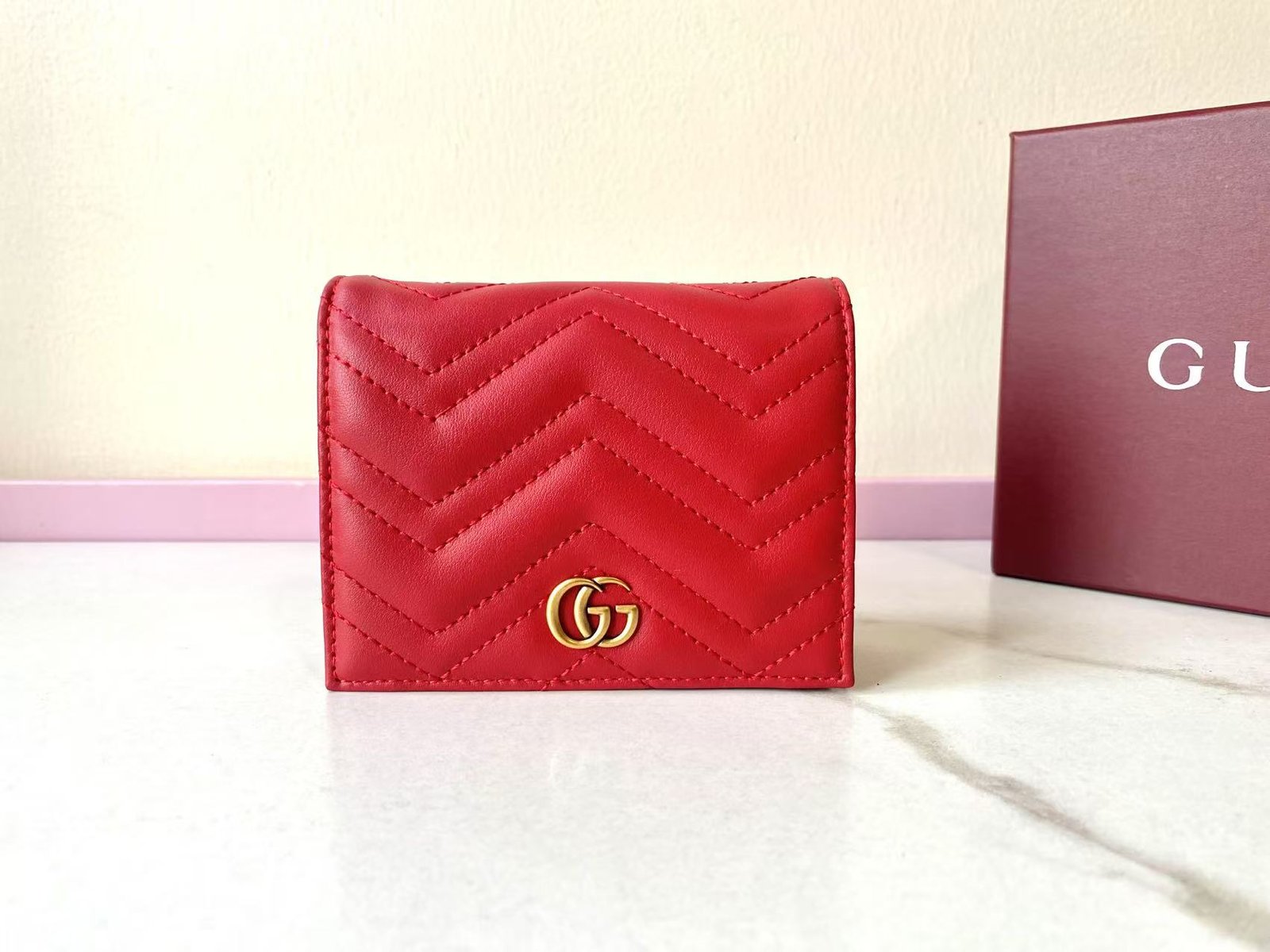 Gucci Portefeuille matelassé à chaîne