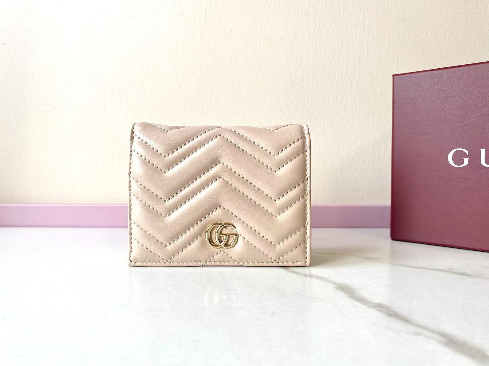 Gucci Portefeuille matelassé à chaîne