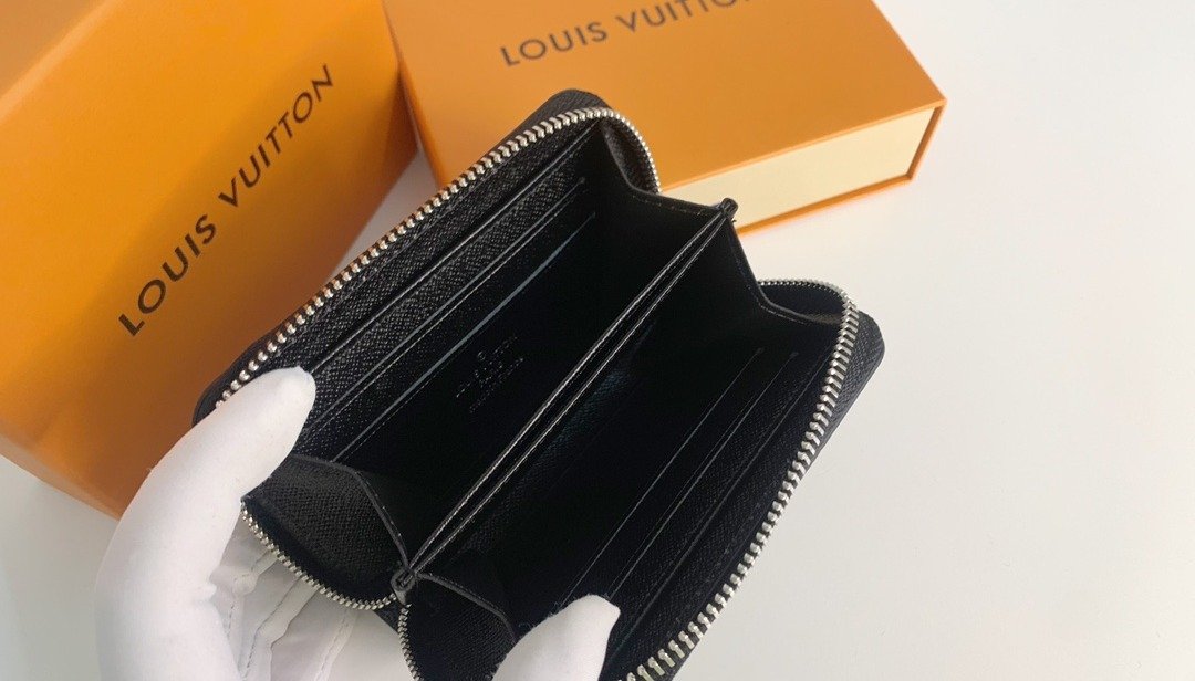Louis Vuitton Portefeuille zippé monogramme