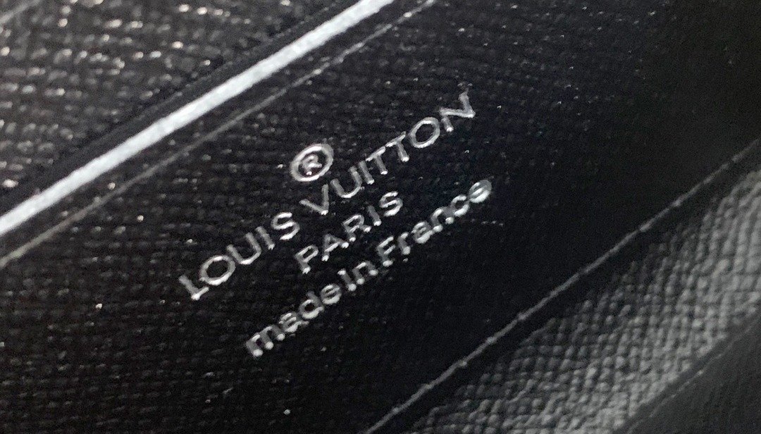 Louis Vuitton Portefeuille zippé monogramme