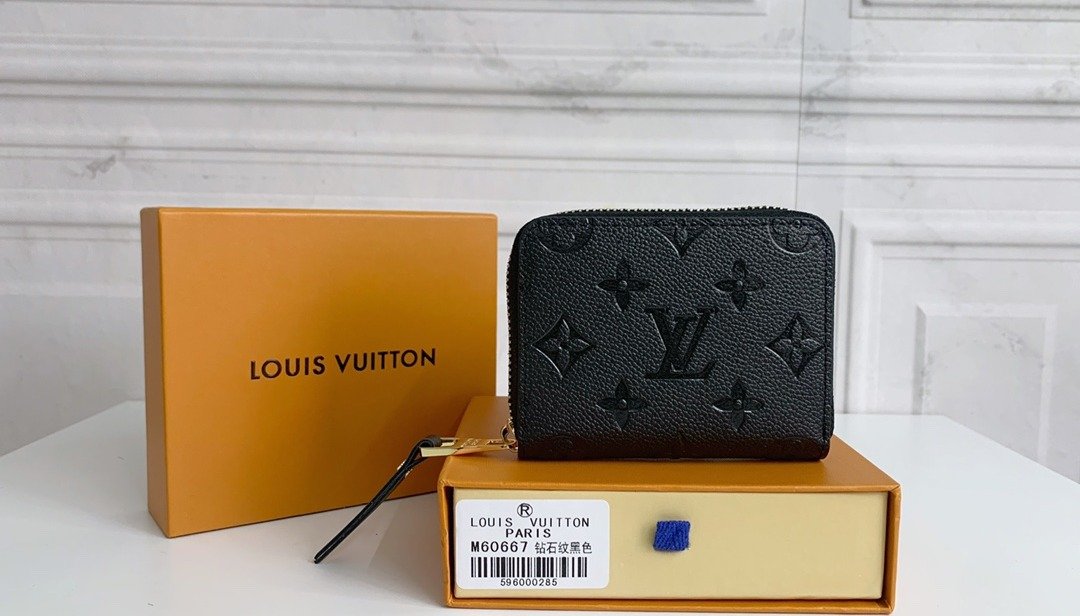 Louis Vuitton Portefeuille zippé monogramme