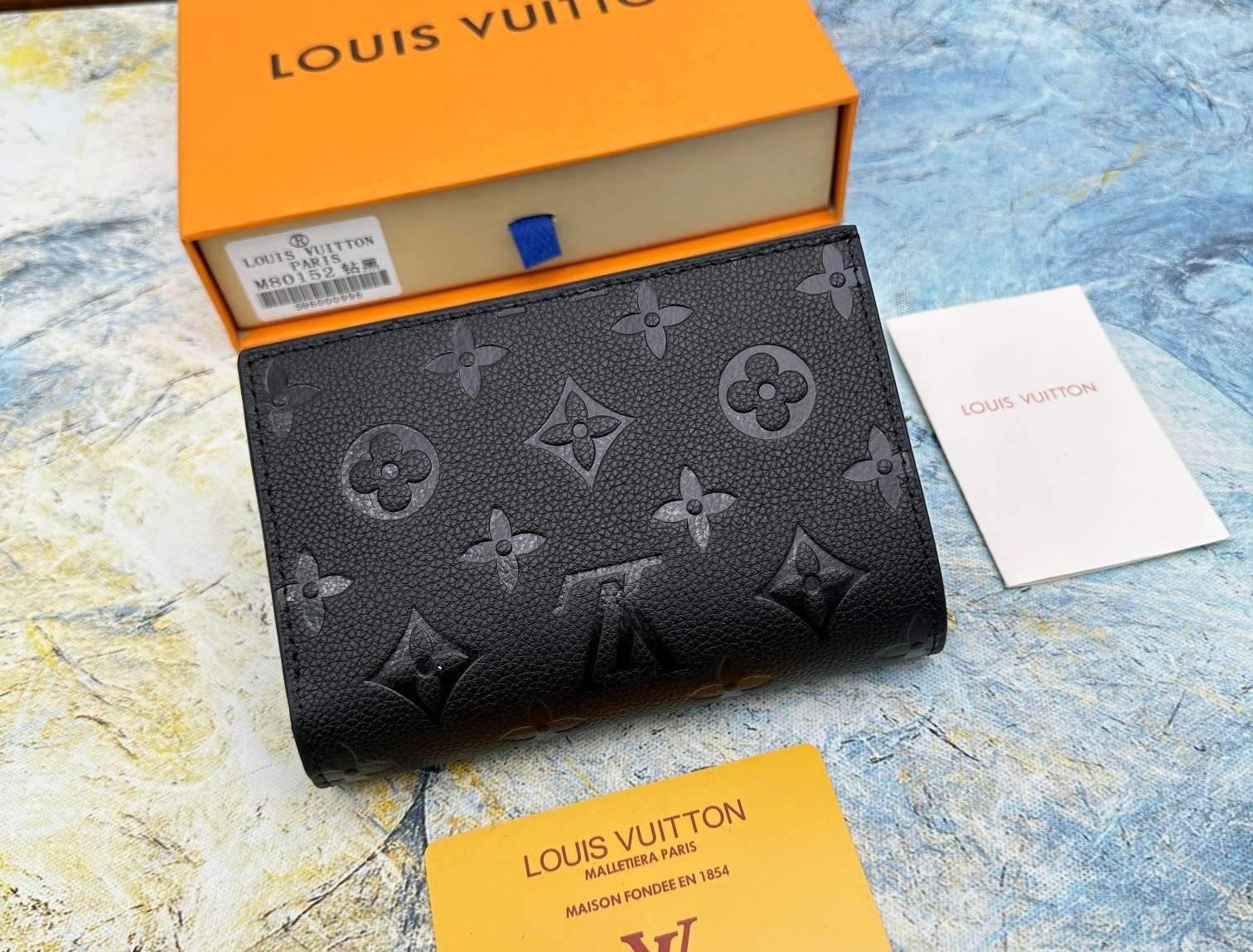 Louis Vuitton Portefeuille zippé monogramme