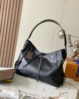 Louis Vuitton Sac épaule souple à détails monogrammés Noir