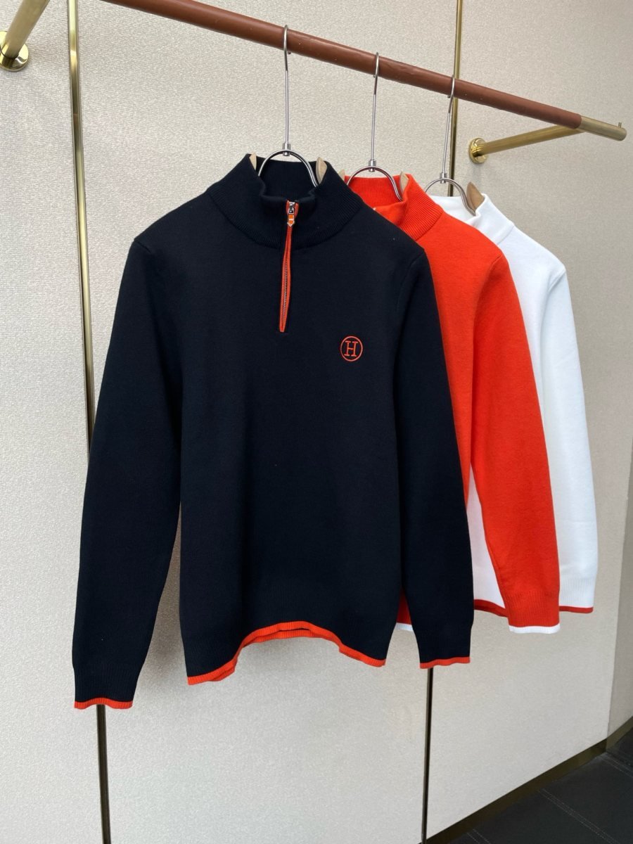 pull à col zippé et monogramme h brodé