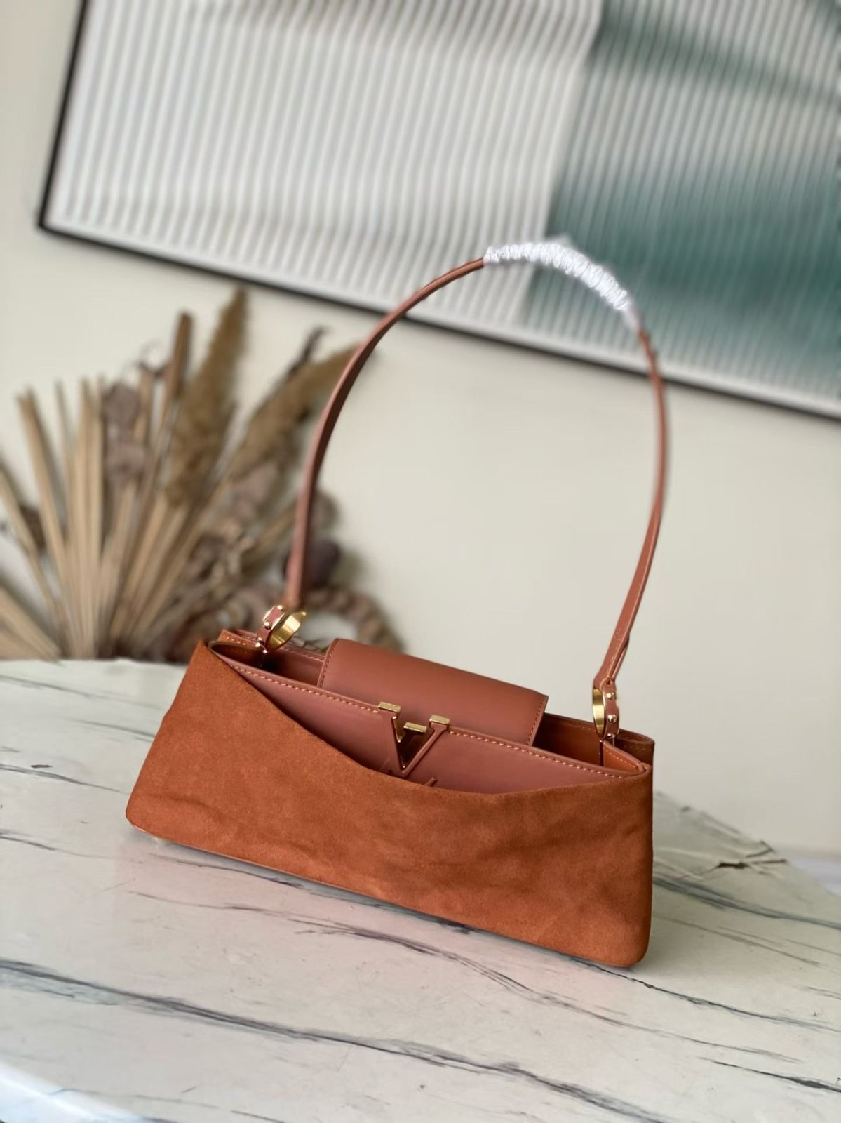 louis vuitton sac baguette à anse rigide et fermoir lv