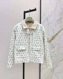 Hermès Veste matelassée écrue à motif fers à cheval verts